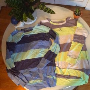 Two striped shirts with a cross stitched collar